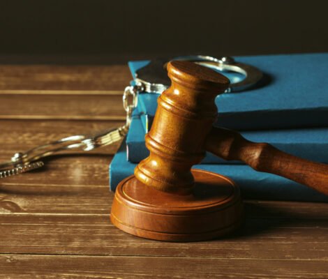 Gavel With Books On Old Wooden Desk Gavel With Books On Old Wooden Desk